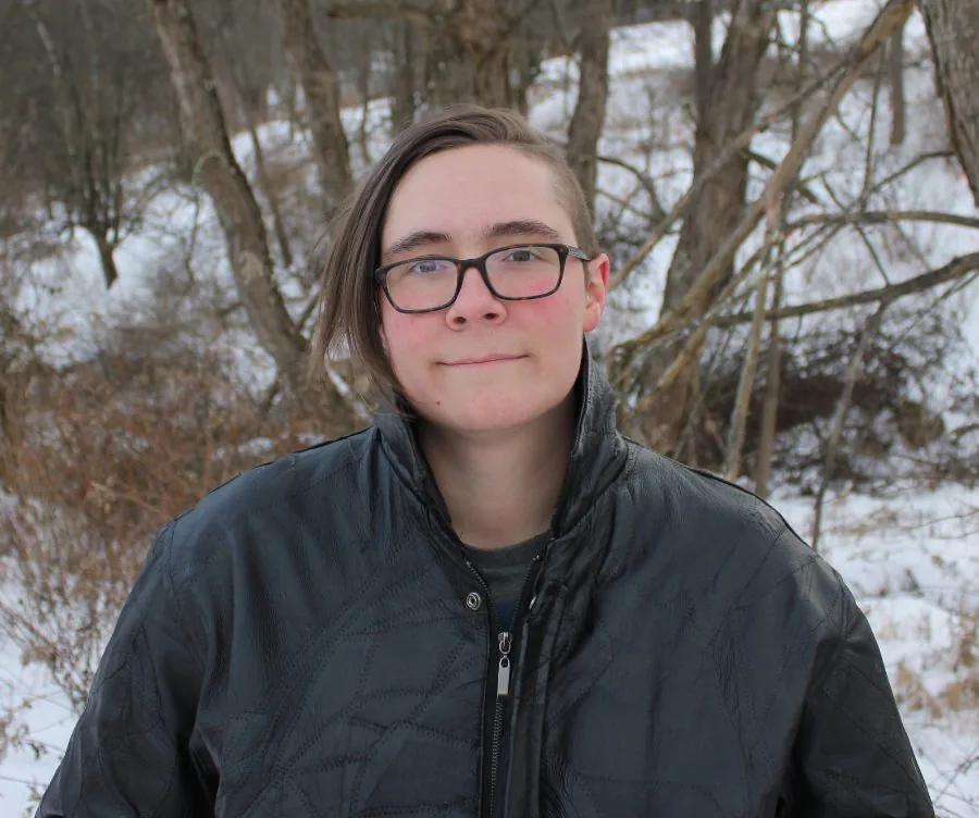 Person in coat on snowy day